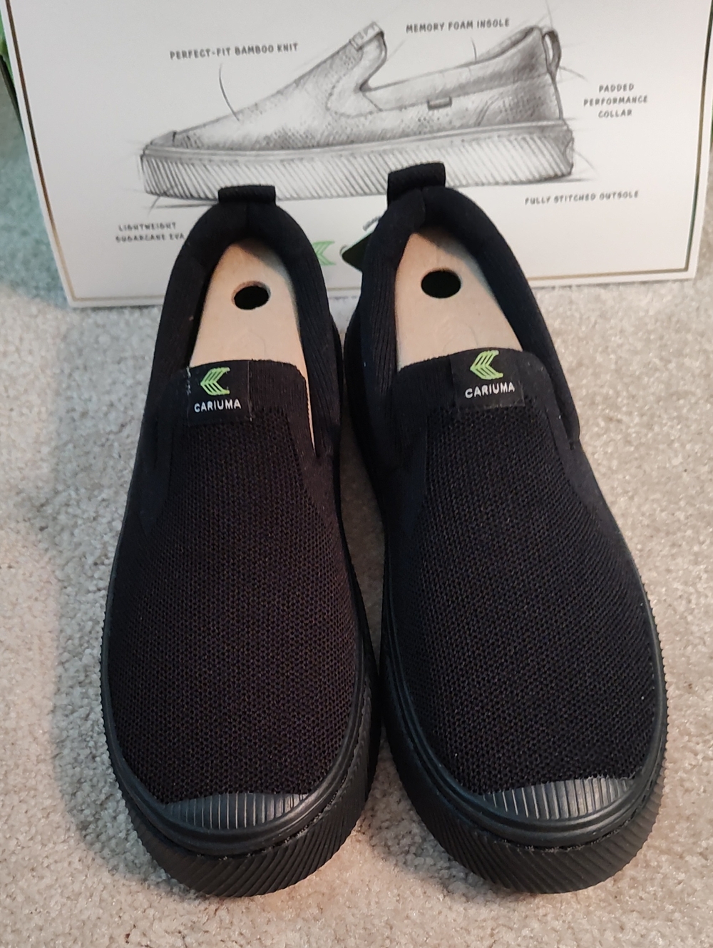 Cariuma Black Knit Slip-On Sneakers with Green Logo